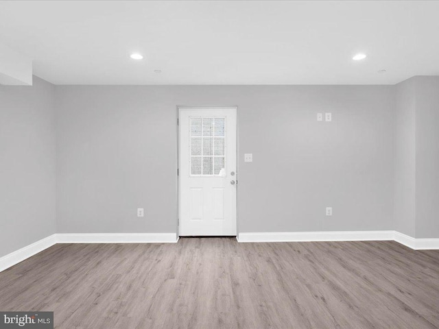 empty room with light wood-type flooring