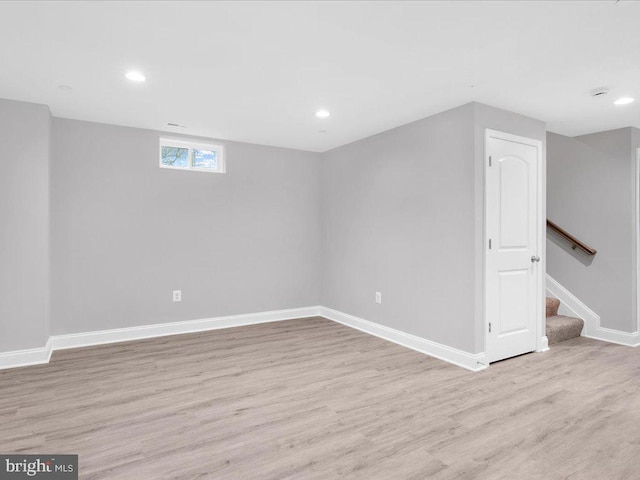 basement featuring light wood-type flooring