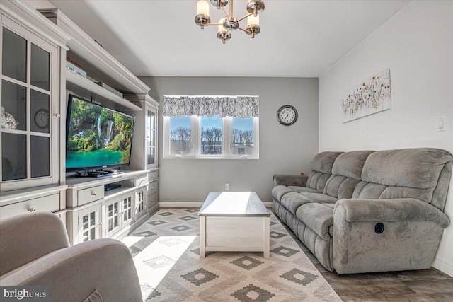 living room featuring a notable chandelier