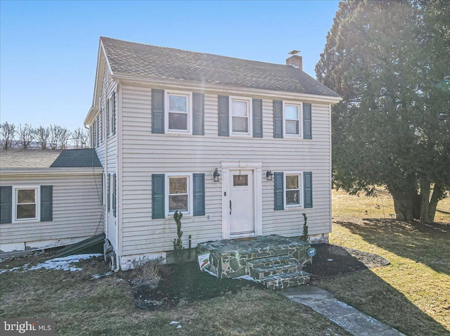 colonial house with a front lawn