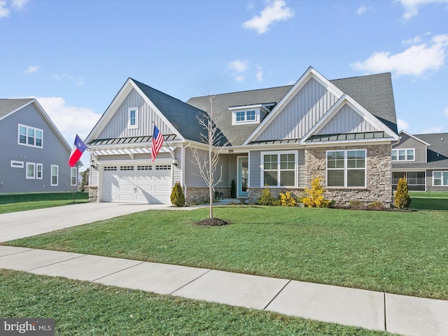 craftsman-style house with a garage and a front yard