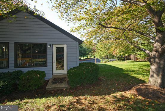 view of home's exterior featuring a yard