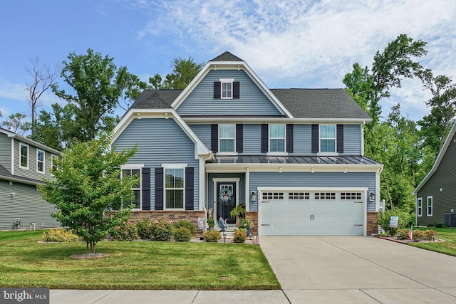 craftsman-style home with a garage, central AC, and a front yard