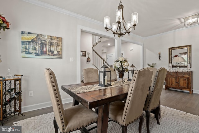 dining room featuring crown molding, an inviting chandelier, and dark hardwood / wood-style flooring