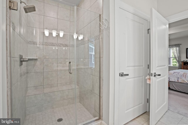 bathroom featuring tile patterned flooring and walk in shower