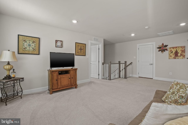 living room with light colored carpet