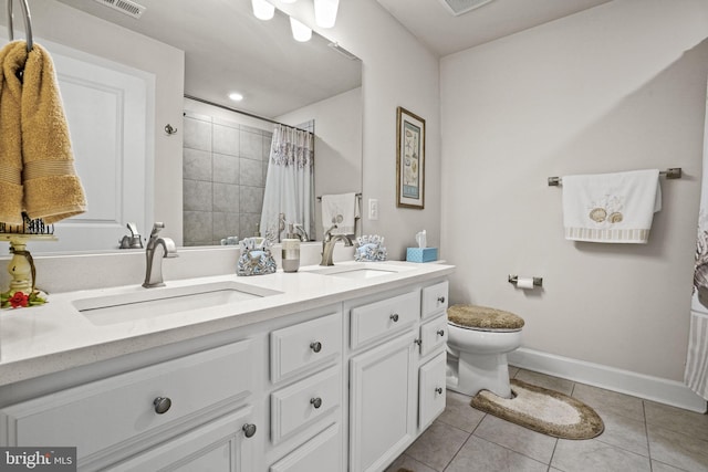 bathroom with vanity, tile patterned flooring, a shower with curtain, and toilet