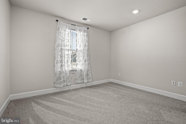 spare room with carpet flooring