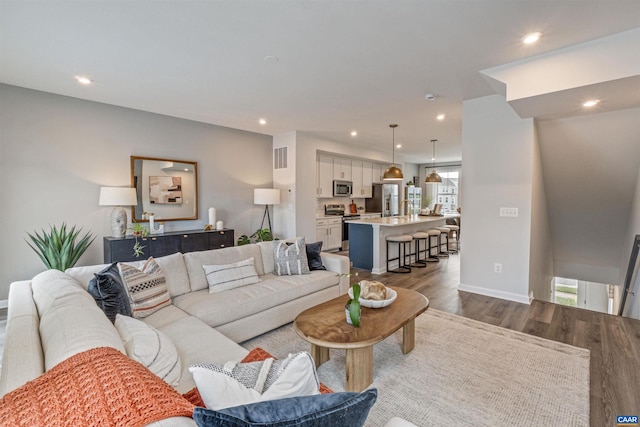 living room with wood-type flooring