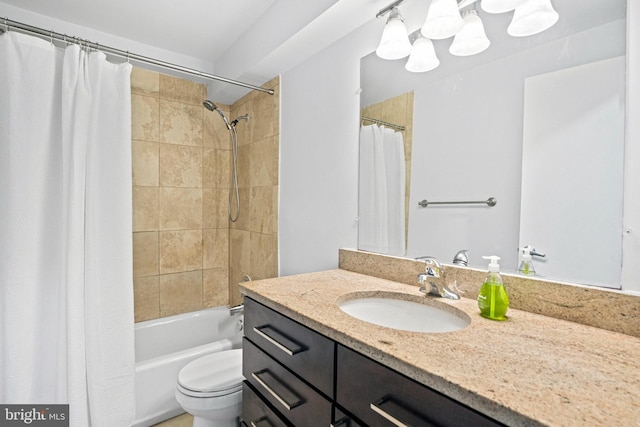 full bathroom featuring vanity, shower / tub combo, and toilet