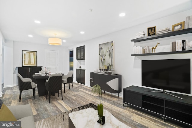 dining area featuring hardwood / wood-style floors