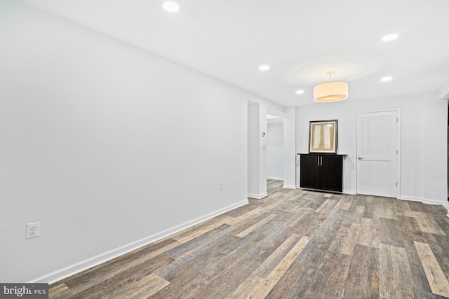 spare room with hardwood / wood-style floors