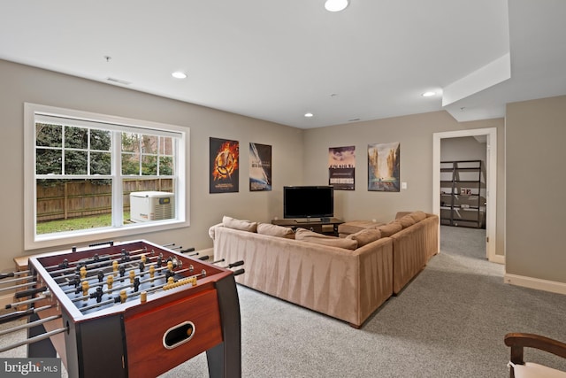 living room featuring light colored carpet