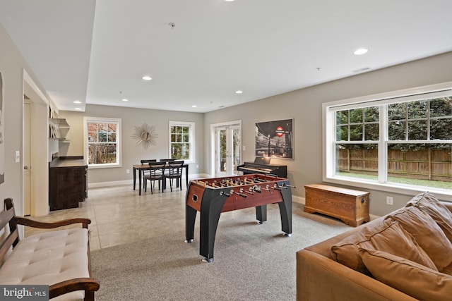 rec room with light tile patterned flooring