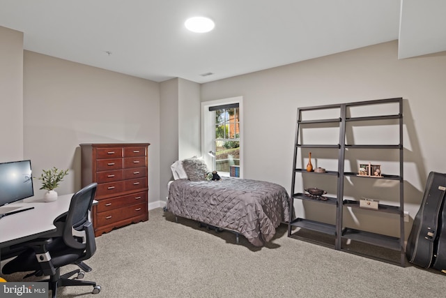 bedroom featuring carpet