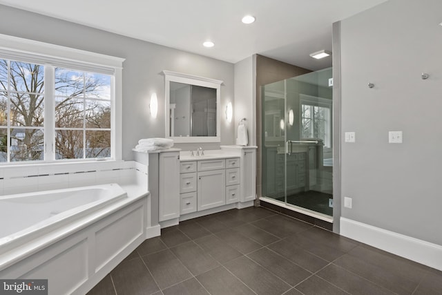 bathroom featuring vanity, separate shower and tub, and tile patterned floors