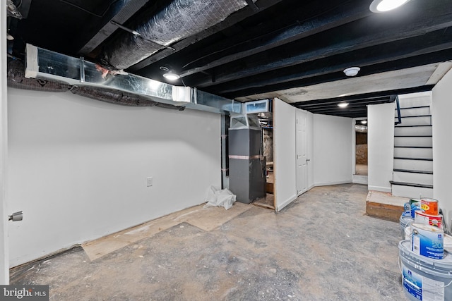 basement featuring heating unit