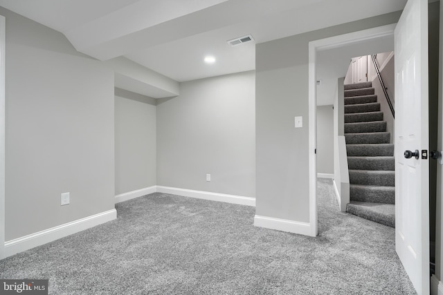 basement with light carpet