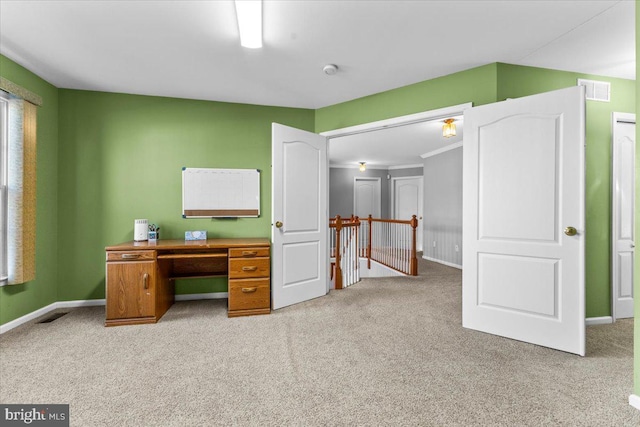 home office featuring light carpet, visible vents, and baseboards