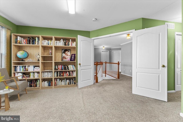 sitting room with carpet flooring and visible vents