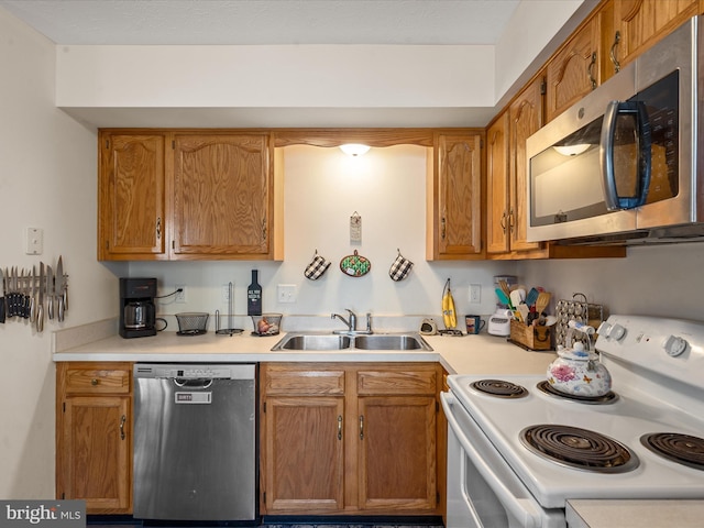 kitchen featuring stainless steel appliances and sink