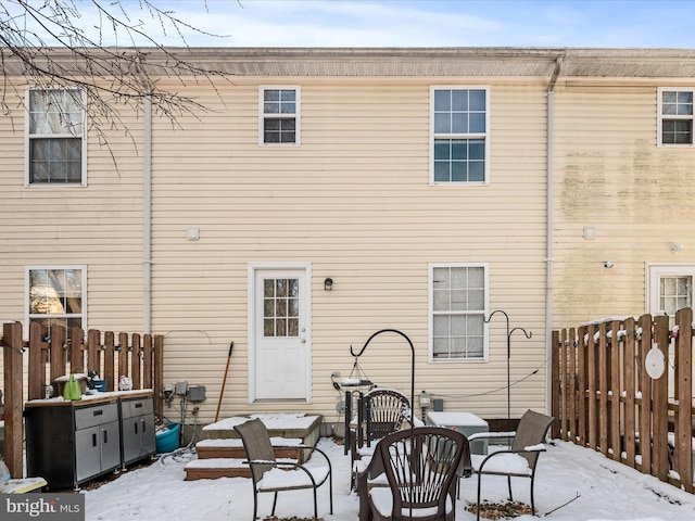 view of snow covered property