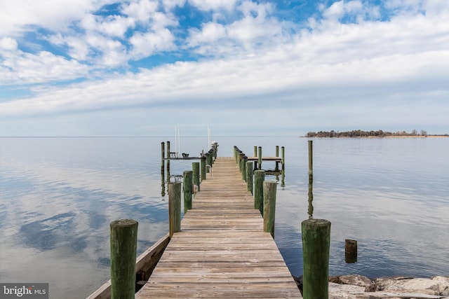 dock area featuring a water view and boat lift