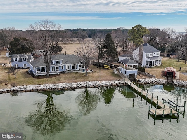 drone / aerial view with a water view