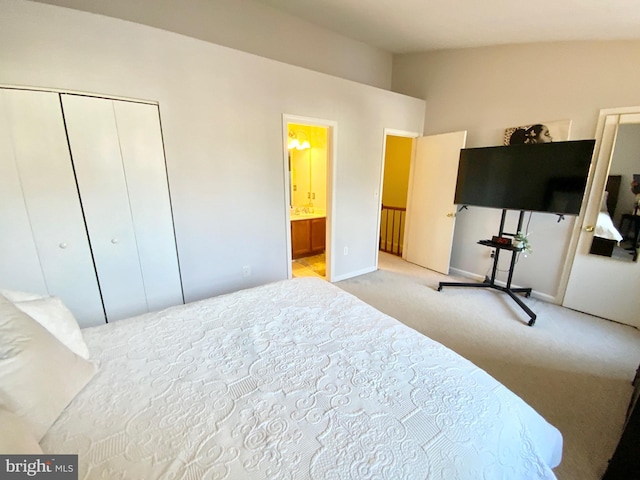 carpeted bedroom featuring a closet