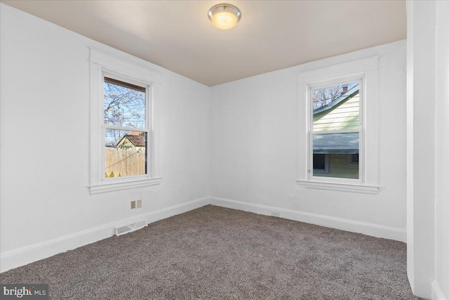 view of carpeted spare room