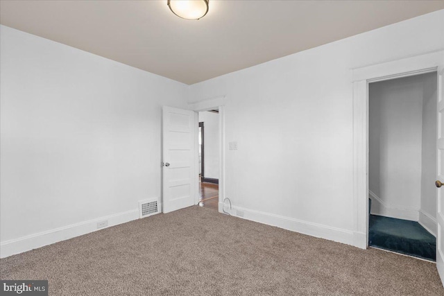 unfurnished bedroom with carpet