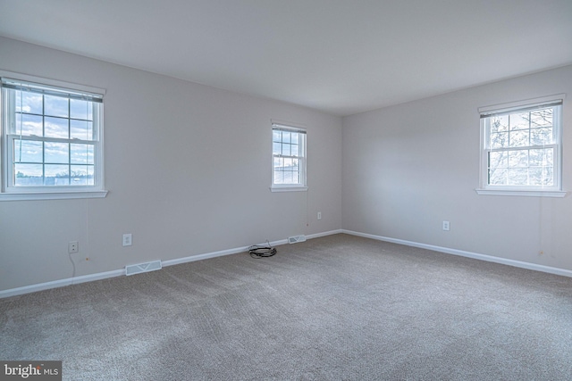 view of carpeted spare room