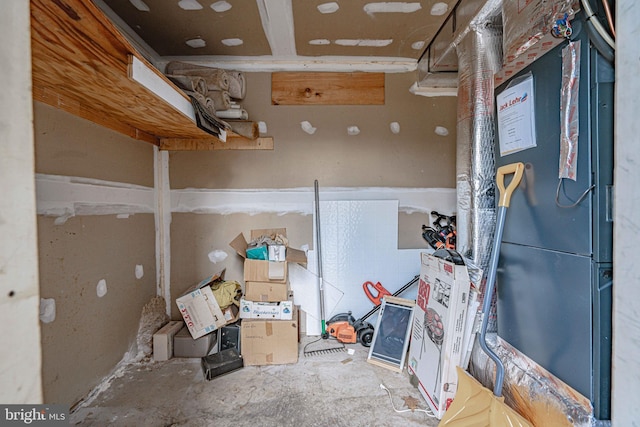 storage room featuring heating unit