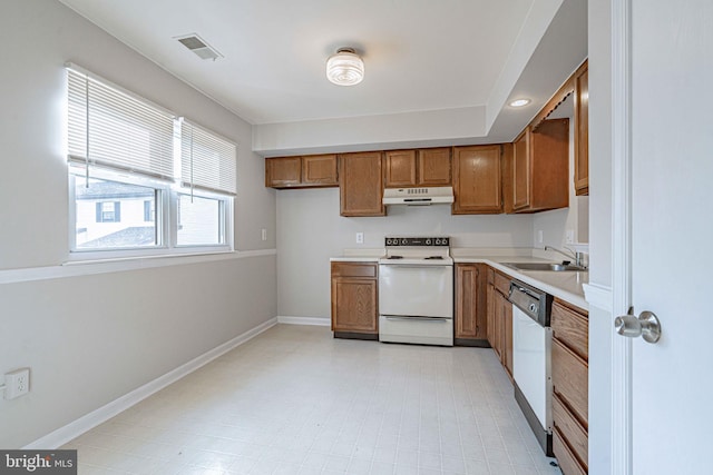 kitchen with sink and white appliances