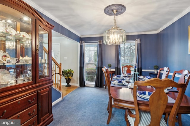 dining area with crown molding, light colored carpet, and a notable chandelier