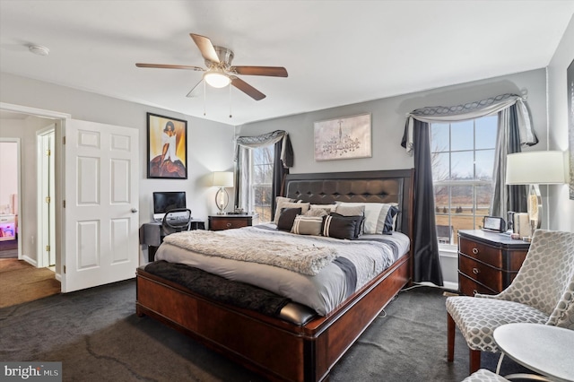 carpeted bedroom featuring ceiling fan