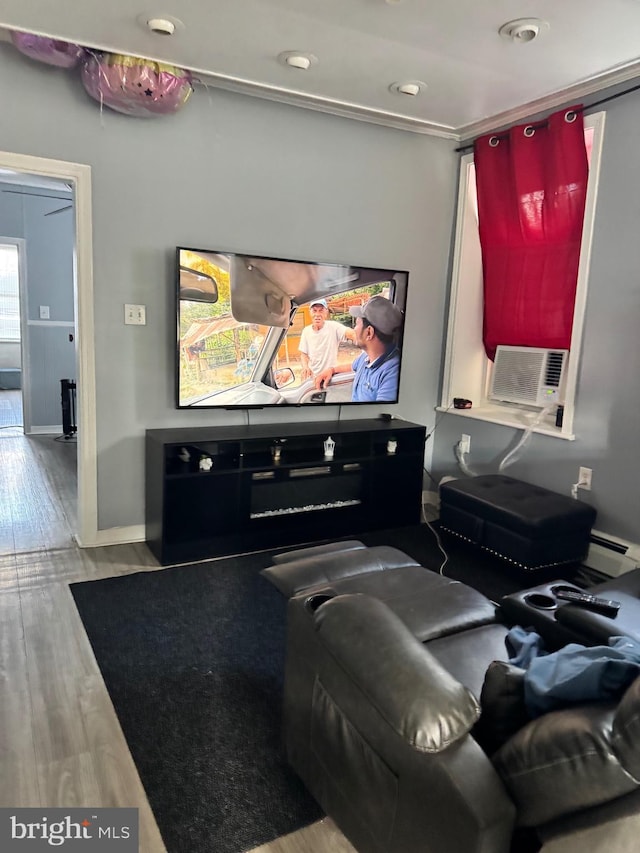 home theater room with recessed lighting, light wood-type flooring, cooling unit, and baseboards