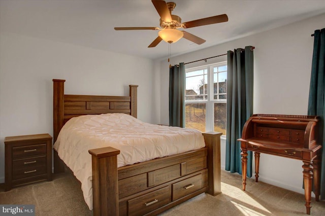 bedroom featuring light carpet and ceiling fan