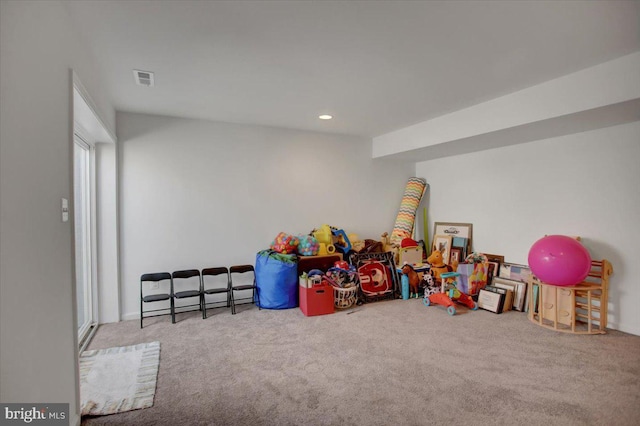 playroom featuring carpet flooring