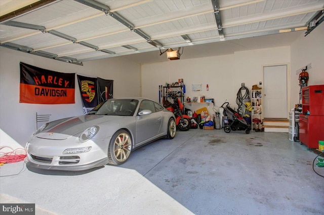 garage featuring a garage door opener