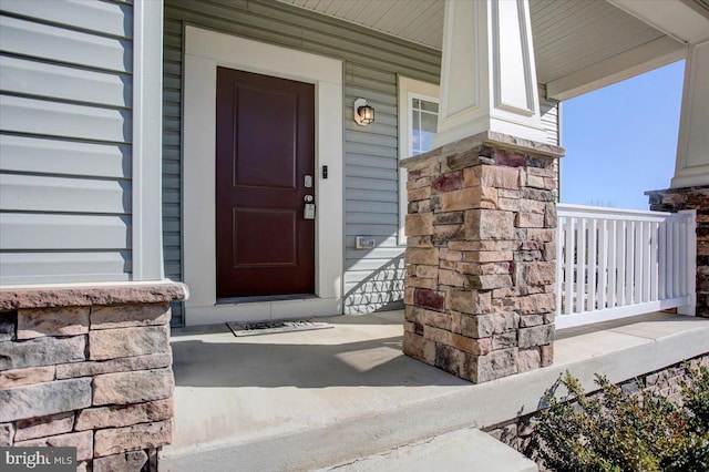 property entrance with a porch