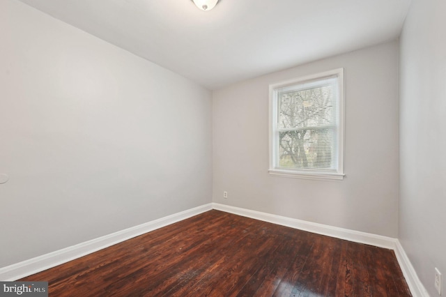 spare room featuring hardwood / wood-style floors