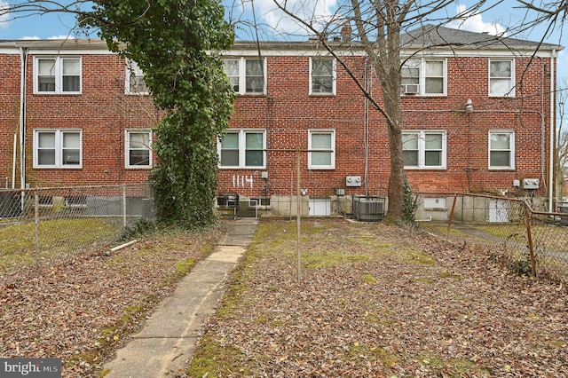 rear view of property with central air condition unit