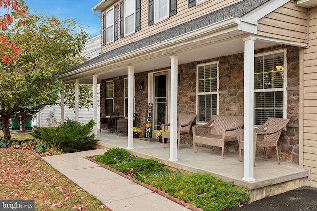 entrance to property with covered porch