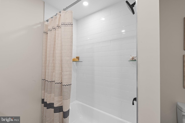 bathroom with shower / bath combination with curtain