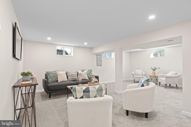 carpeted living room with a wealth of natural light