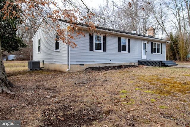 view of front of property with central air condition unit