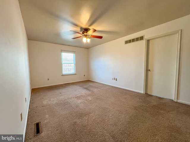 unfurnished bedroom with ceiling fan and carpet floors