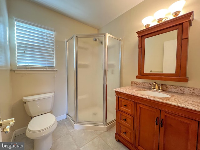 bathroom featuring vanity, tile patterned flooring, a shower with shower door, and toilet