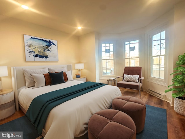 bedroom featuring dark hardwood / wood-style flooring and a baseboard heating unit